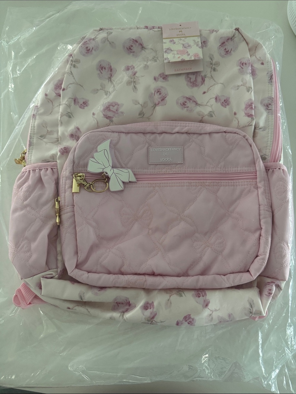 Loveshackfancy and Yoobi Pink Floral Quilted Backpack